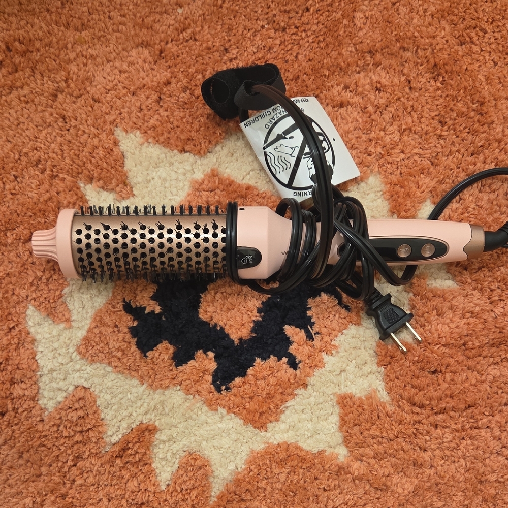 Sleek Pink Hair Styling Brush with Heat Control